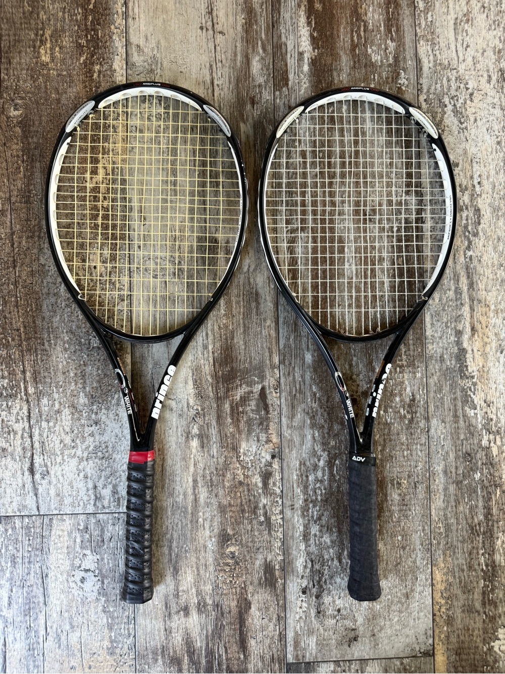 2 used Prince O3 White Midplus tennis racquet